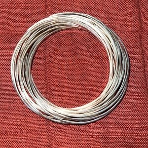 Silpada brand - 21 Bangle salute silver bracelet.  Connected bangles